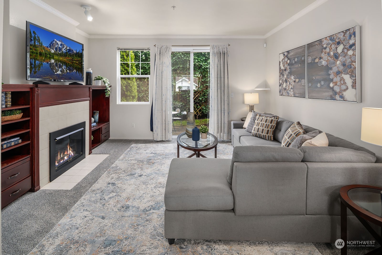 2300 Benson Road South, Unit C5 Renton, WA 98055 - Photo 5 of 19 a living room with furniture and a flat screen tv