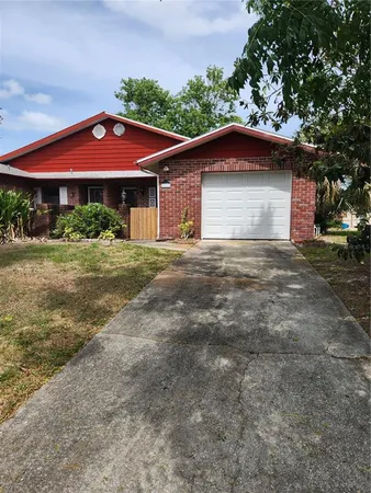 a front view of a house with yard