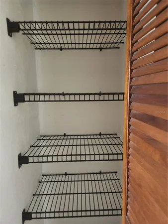 a view of a balcony with wooden floor
