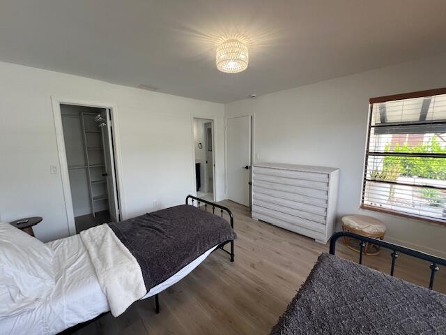 1423 Riverside Circle Wellington, FL 33414 - Photo 14 of 29 a bedroom with a bed and a window