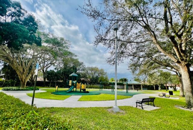 1423 Riverside Circle Wellington, FL 33414 - Photo 27 of 29 a view of a park with large trees