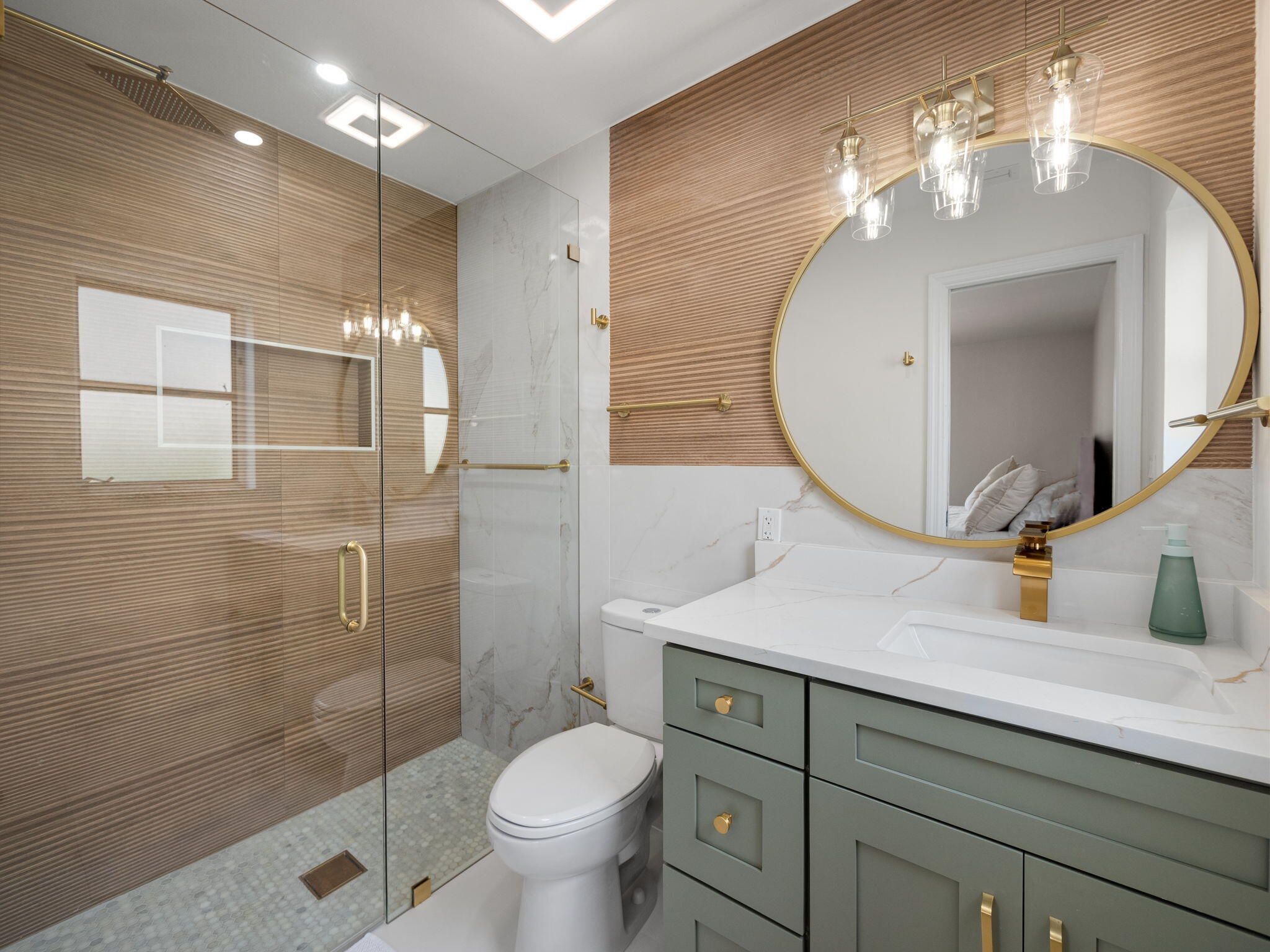 1423 Riverside Circle Wellington, FL 33414 - Photo 6 of 29 a bathroom with a double vanity sink toilet and shower