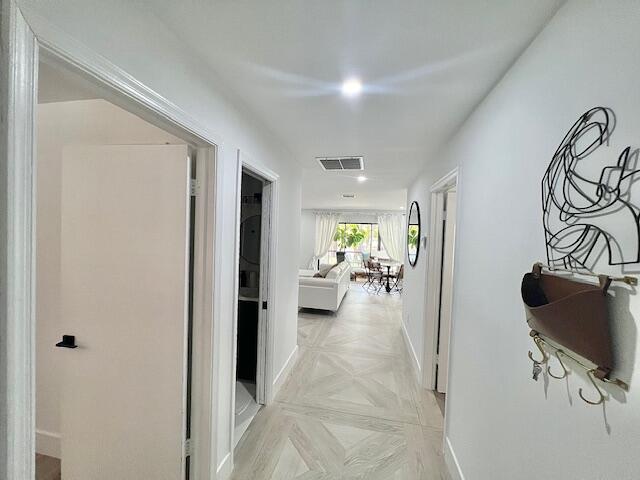 1423 Riverside Circle Wellington, FL 33414 - Photo 10 of 29 a view of a livingroom with furniture and a flat screen tv