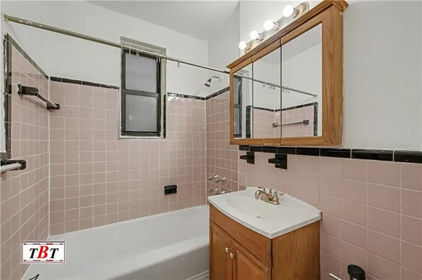 a bathroom with a sink and a bathtub