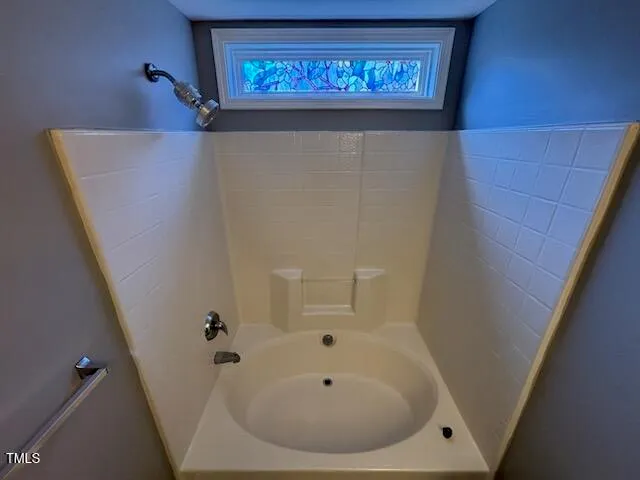 a bathroom with a bathtub