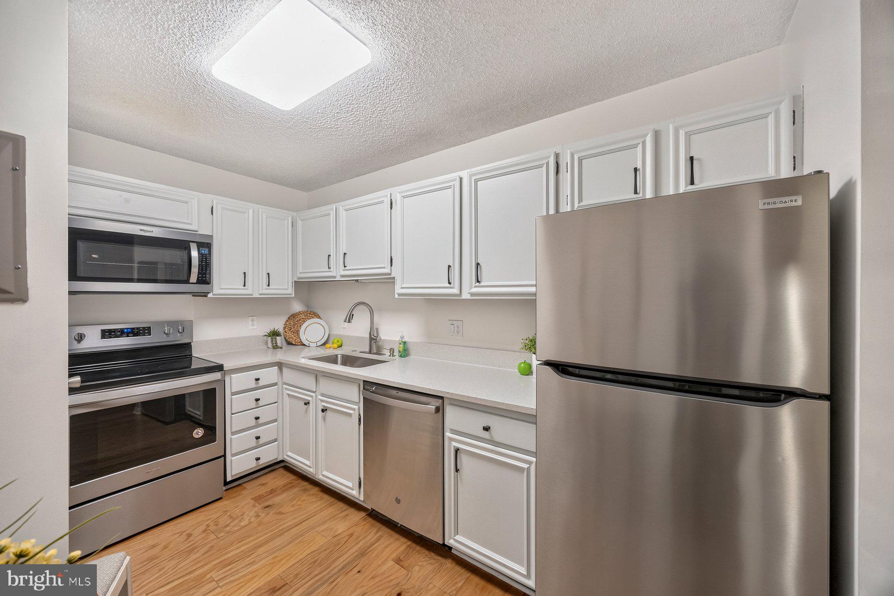 205 East Joppa Road, Unit 302 Towson, MD 21286 - Photo 20 of 52 Modern kitchen with sleek finishes.