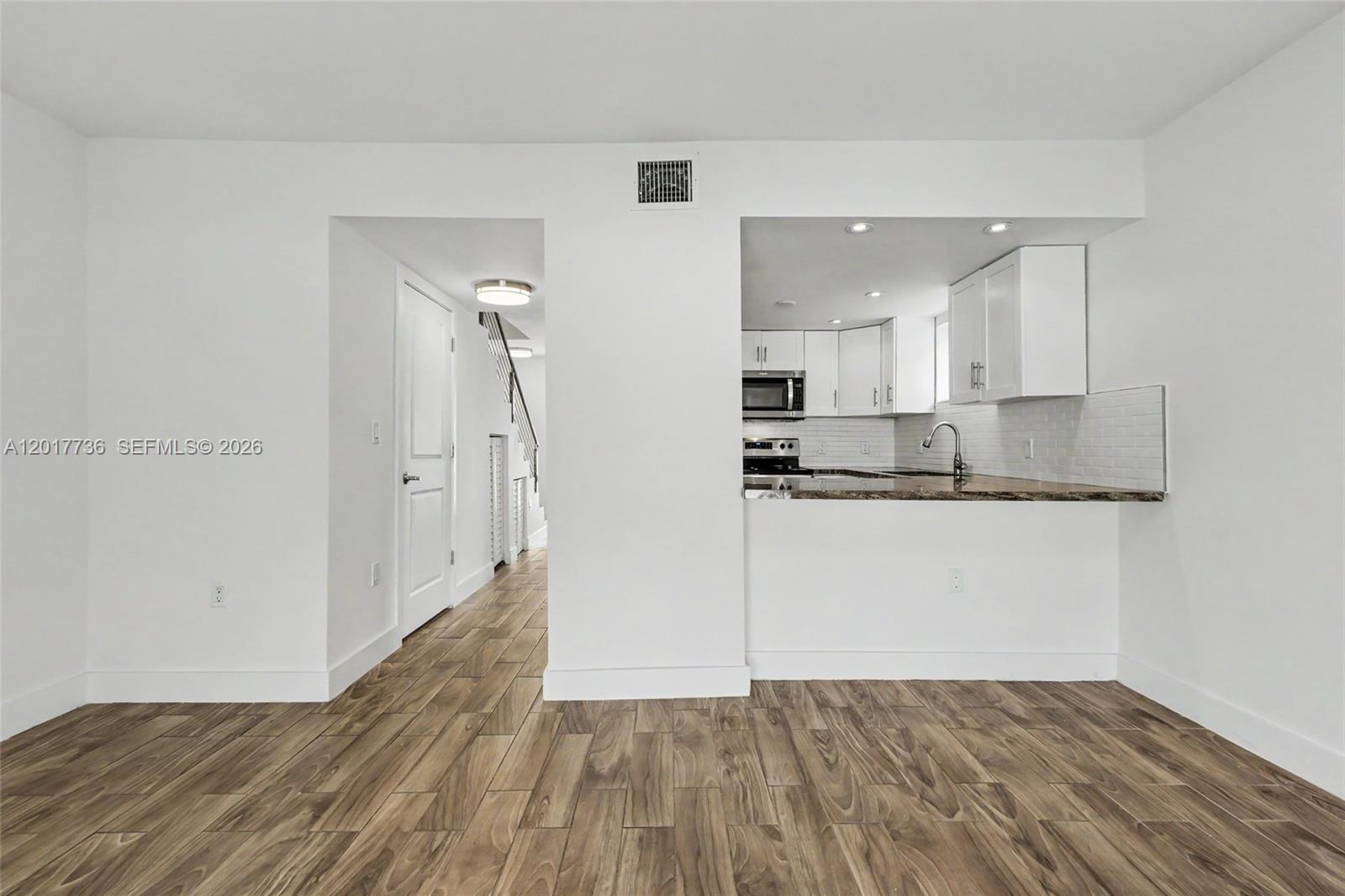 122 Southwest 56th Avenue Miami, FL 33144 - Photo 21 of 48 a view of kitchen with wooden floor