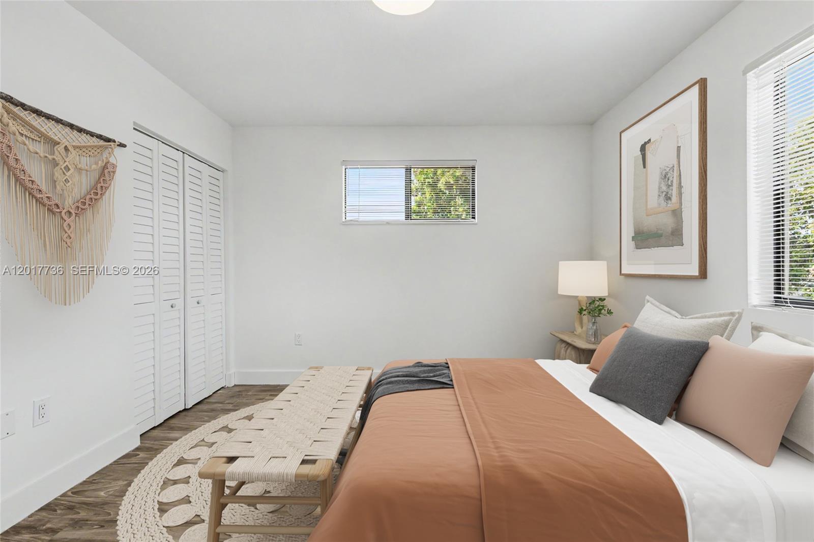 122 Southwest 56th Avenue Miami, FL 33144 - Photo 26 of 48 a bedroom with a bed and a window