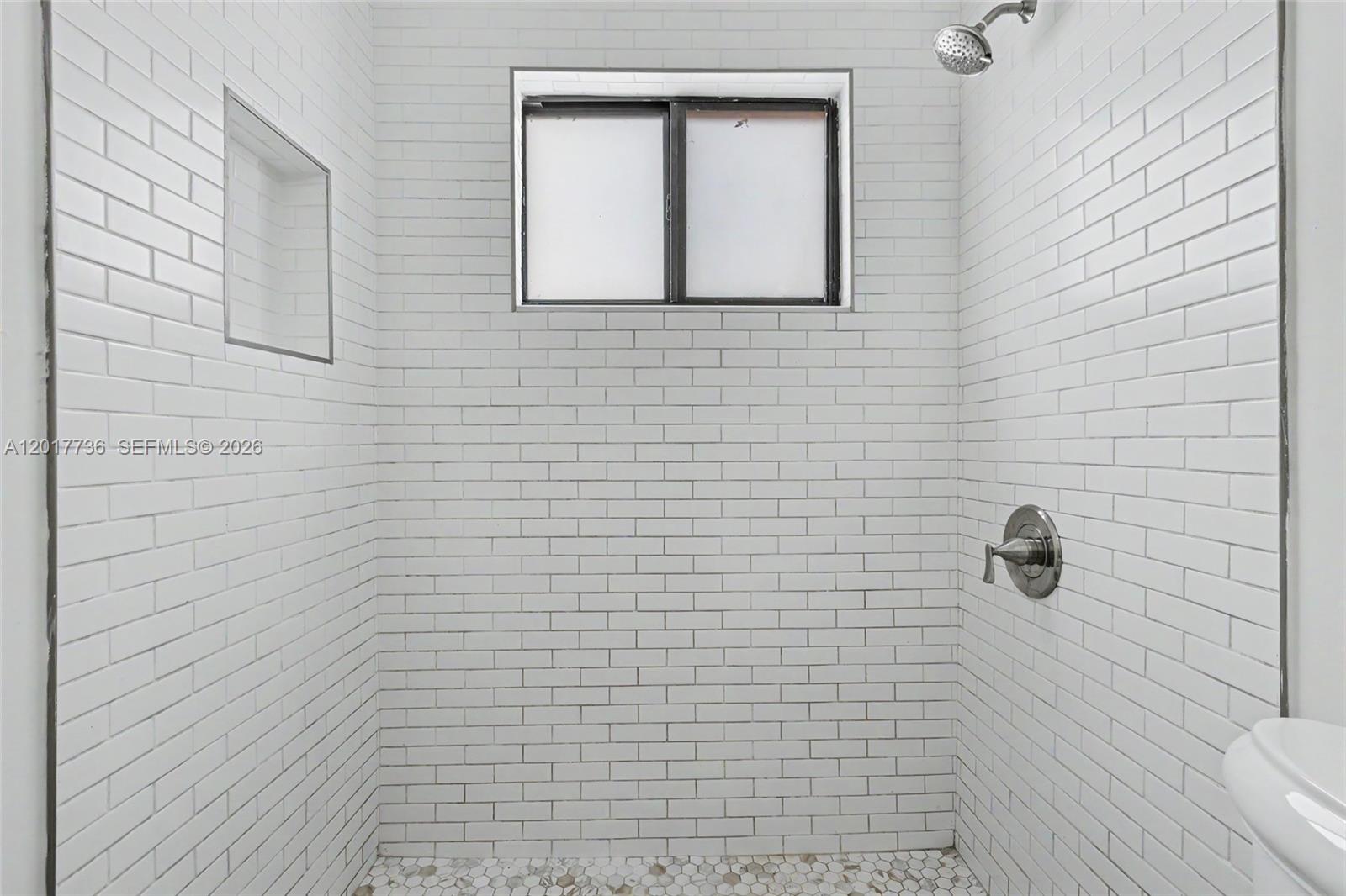 122 Southwest 56th Avenue Miami, FL 33144 - Photo 32 of 48 a bathroom with a toilet