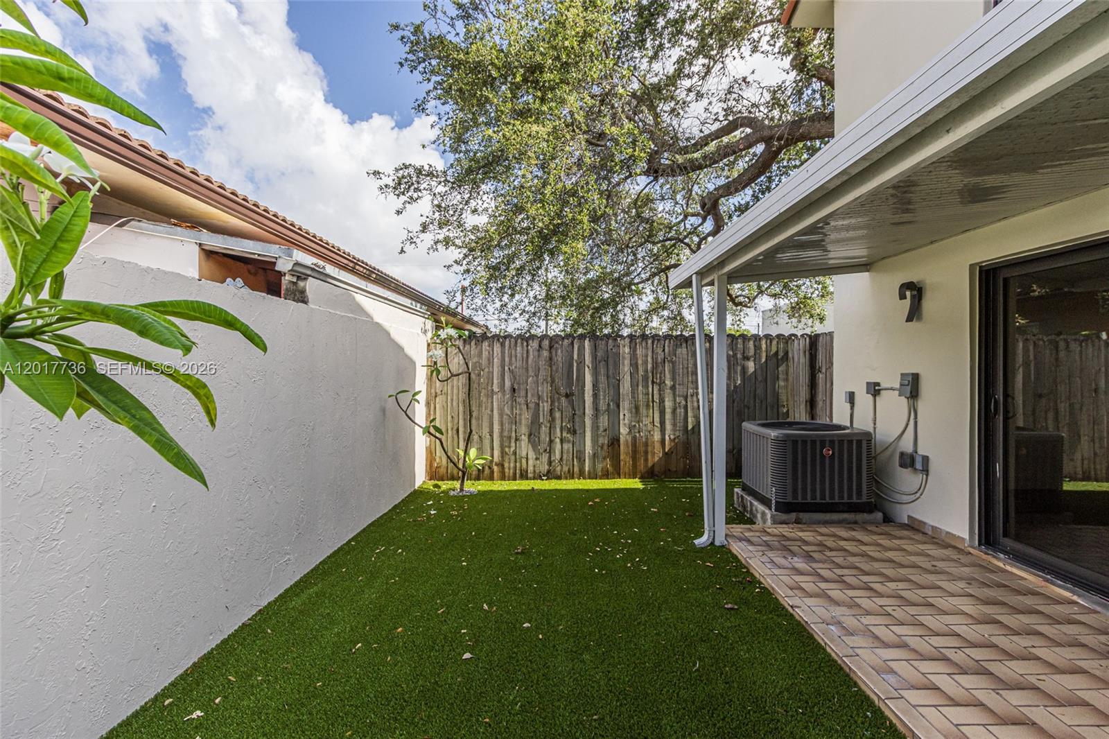 122 Southwest 56th Avenue Miami, FL 33144 - Photo 40 of 48 a house view with a backyard space