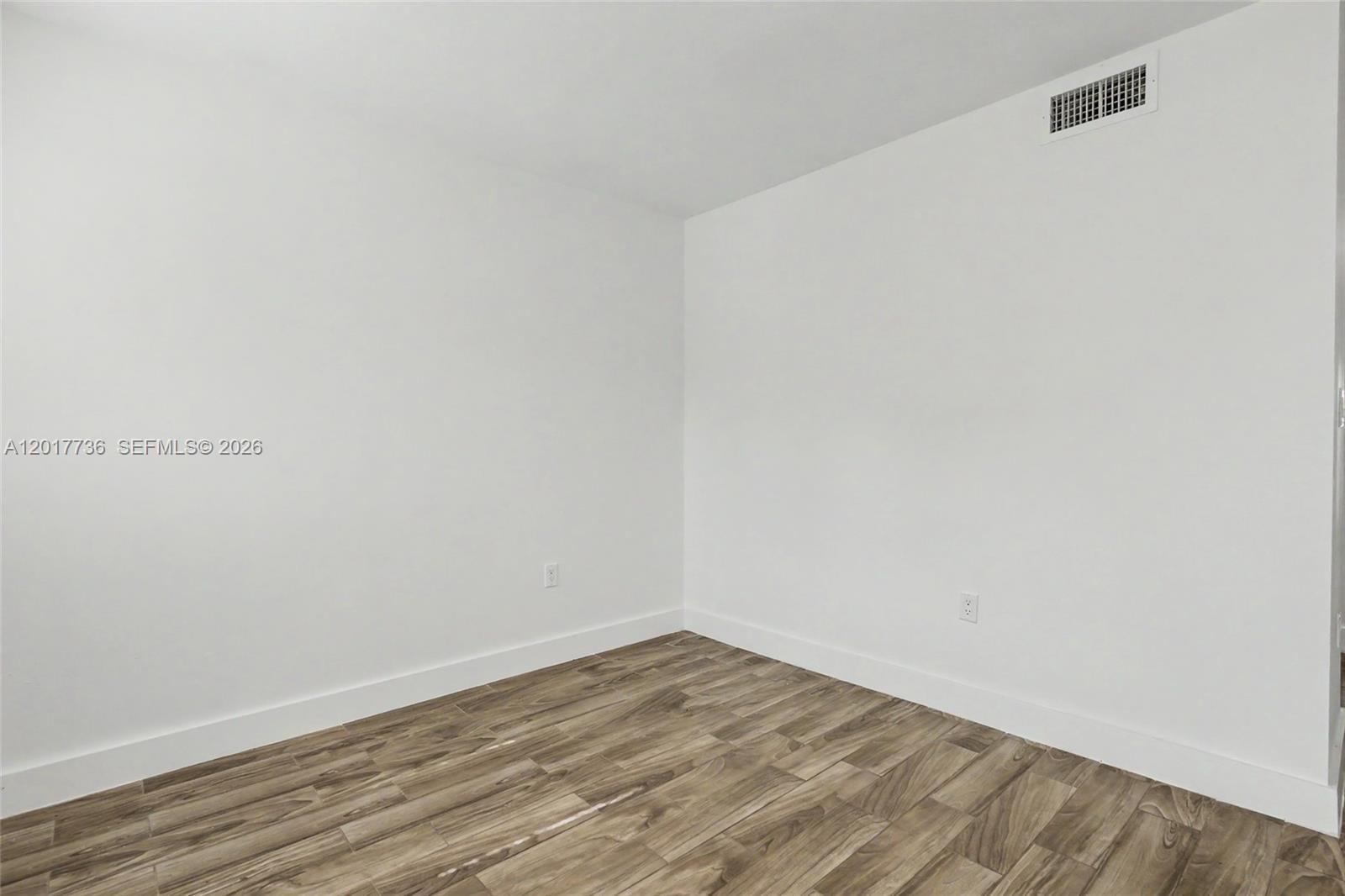 122 Southwest 56th Avenue Miami, FL 33144 - Photo 6 of 48 a view of an empty room