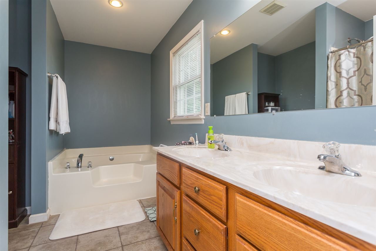 10882 Cook Town Road Bridgewater, VA 22812 - Photo 21 of 47 a utility room with cabinets washer and dryer