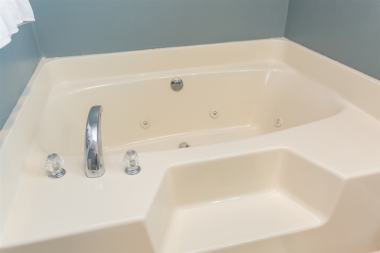 10882 Cook Town Road Bridgewater, VA 22812 - Photo 22 of 47 a bathroom with a tub