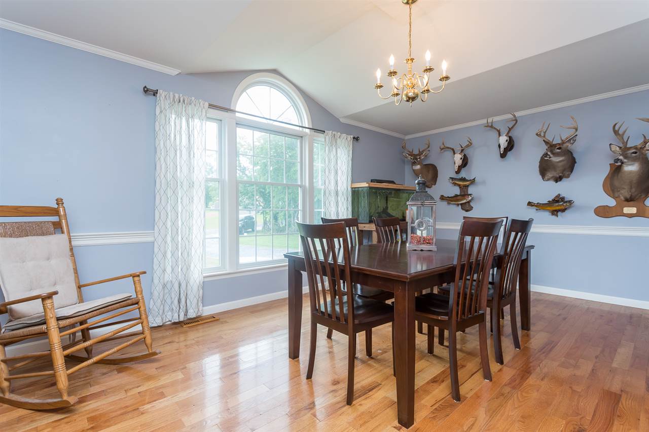 10882 Cook Town Road Bridgewater, VA 22812 - Photo 3 of 47 a view of a dining room with furniture window and wooden floor