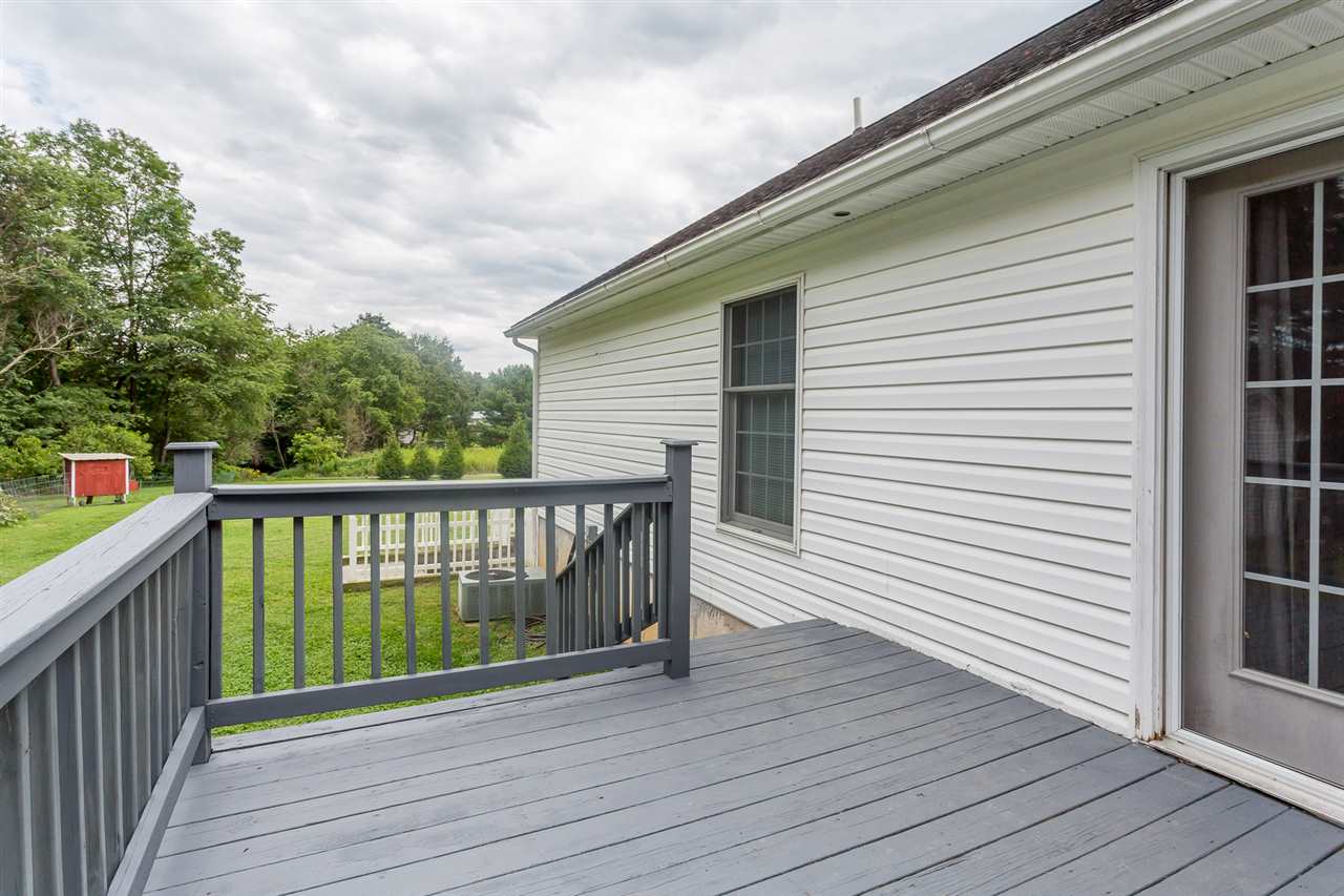 10882 Cook Town Road Bridgewater, VA 22812 - Photo 39 of 47 a view of deck with wooden floor and fence and a floor to ceiling window
