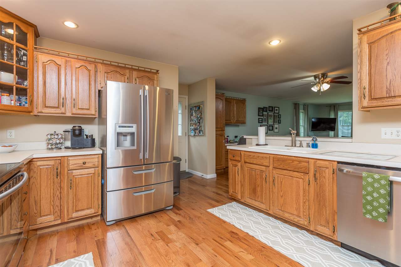 10882 Cook Town Road Bridgewater, VA 22812 - Photo 4 of 47 a kitchen with stainless steel appliances granite countertop a refrigerator sink and cabinets