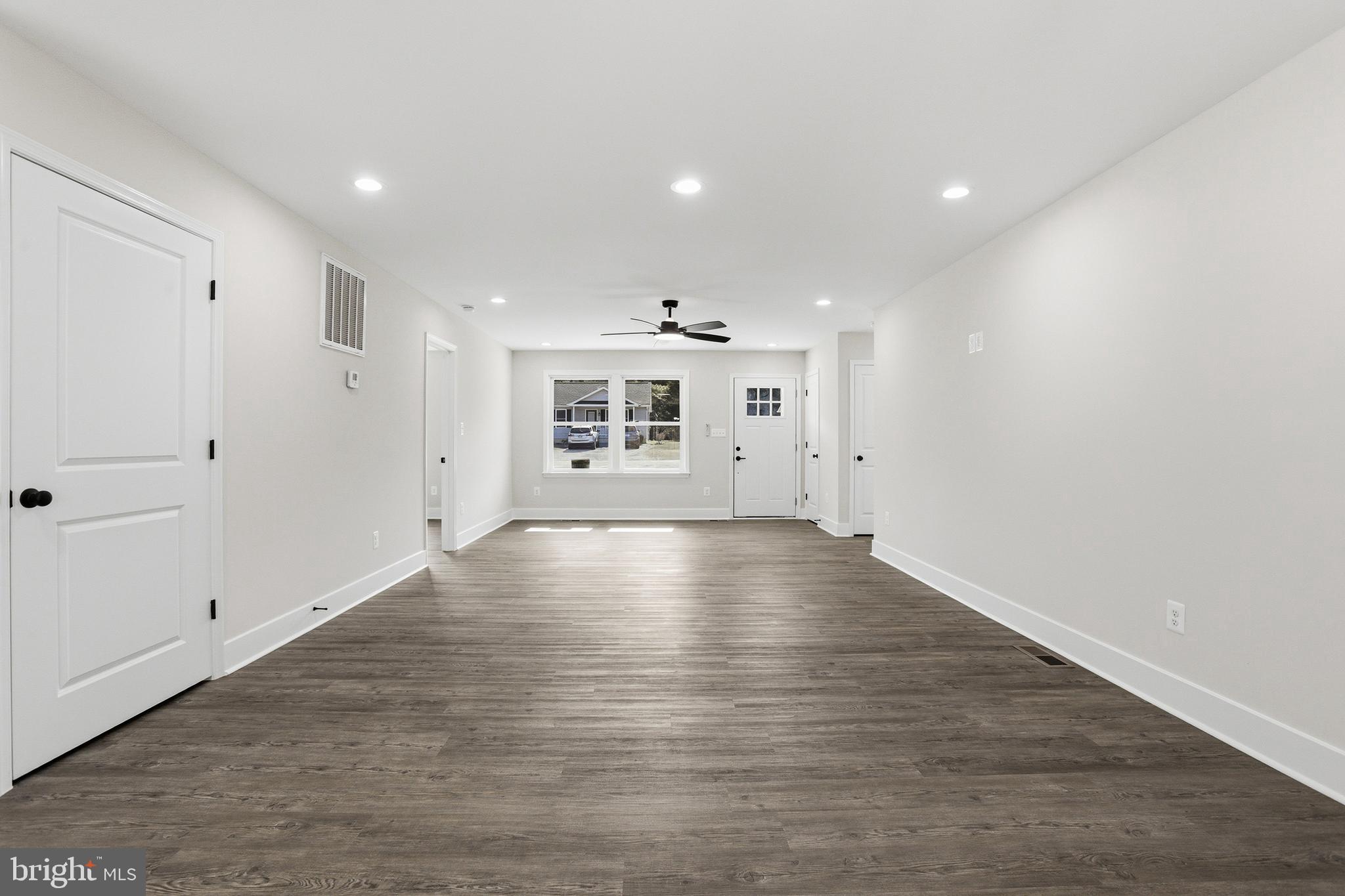 826 South Glebe Road Montross, VA 22520 - Photo 19 of 37 a view of an empty room with wooden floor
