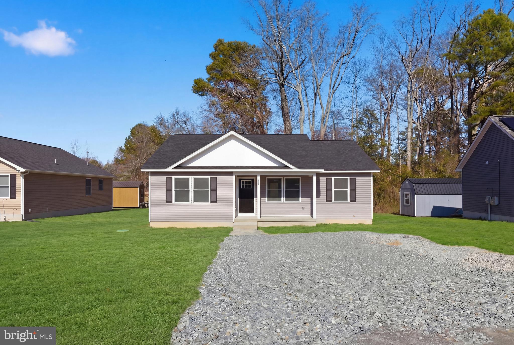 826 South Glebe Road Montross, VA 22520 - Photo 36 of 37 front view of a house with a yard
