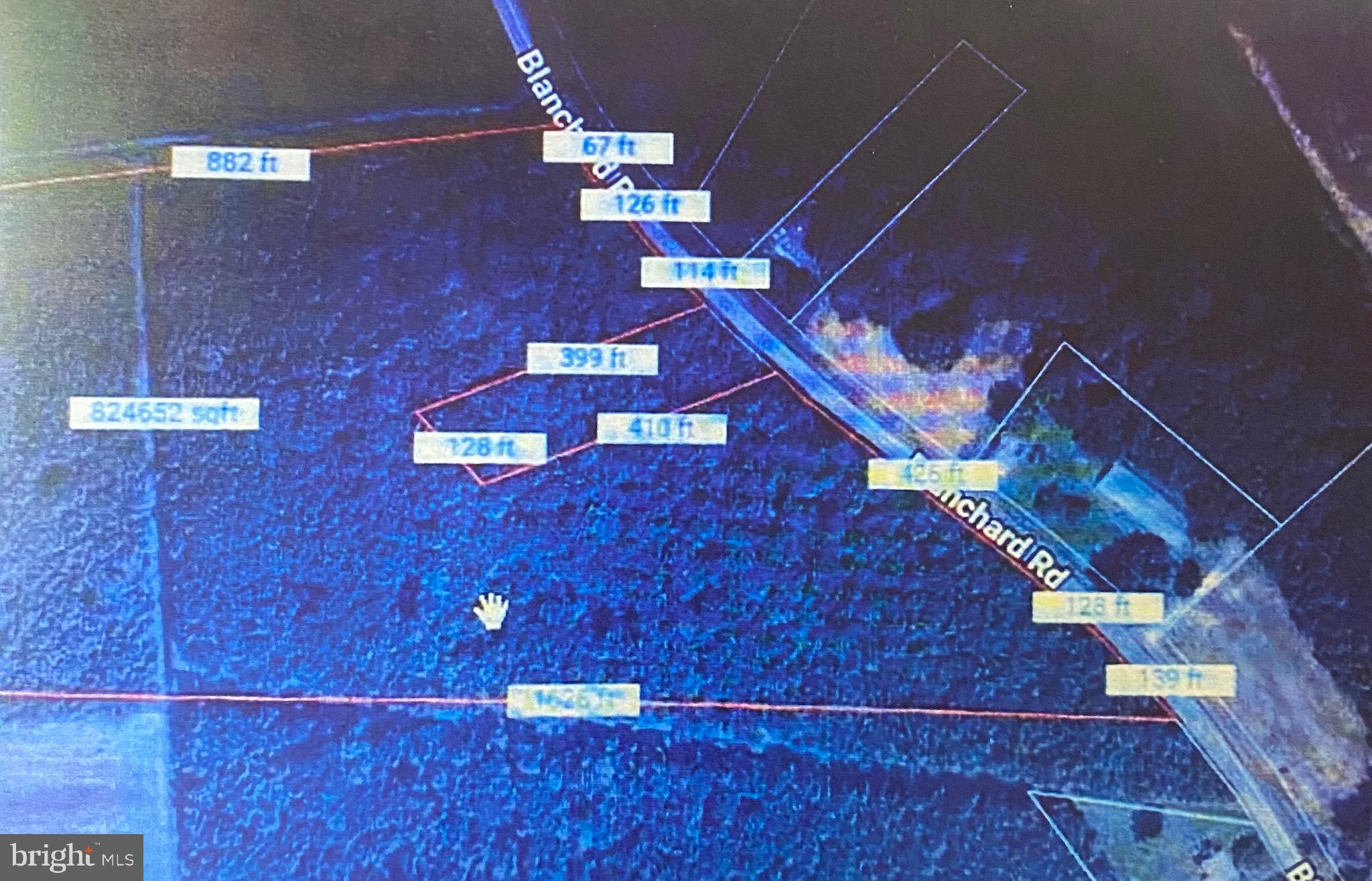 a view of a hall with sitting area