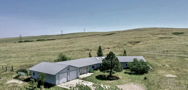 a view of a terrace with a lake view