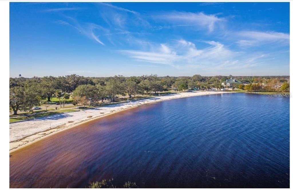 922 Delaware Avenue St. Cloud, FL 34769 - Photo 29 of 31 a view of a lake and a mountain