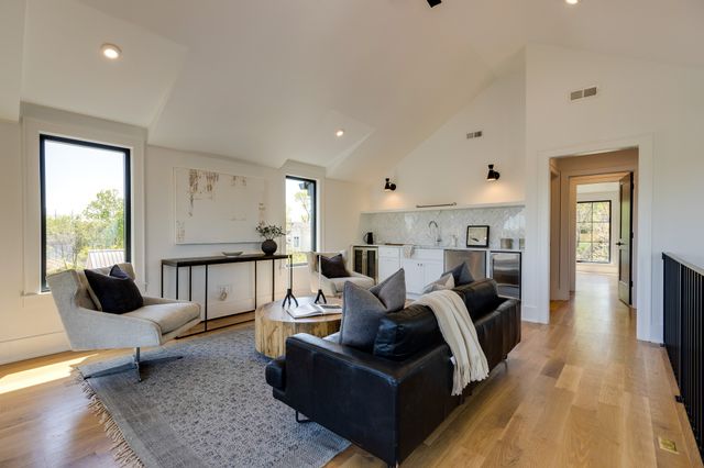 a bathroom with a bathtub and a sink