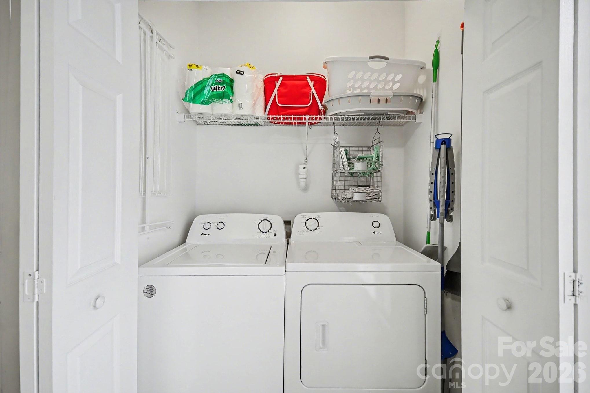 8048 Stoneham Court Matthews, NC 28105 - Photo 10 of 15 a utility room with dryer and washer