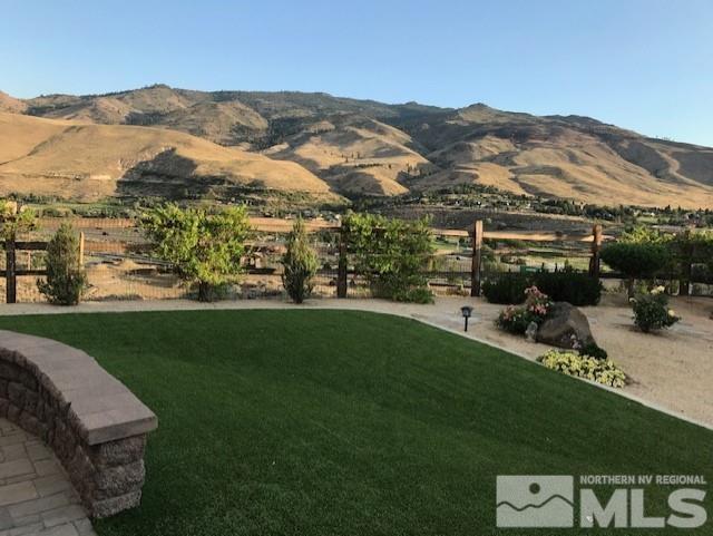9266 Maplehurst Trail Reno, NV 89523 - Photo 11 of 29 a view of a lush green hillside and houses
