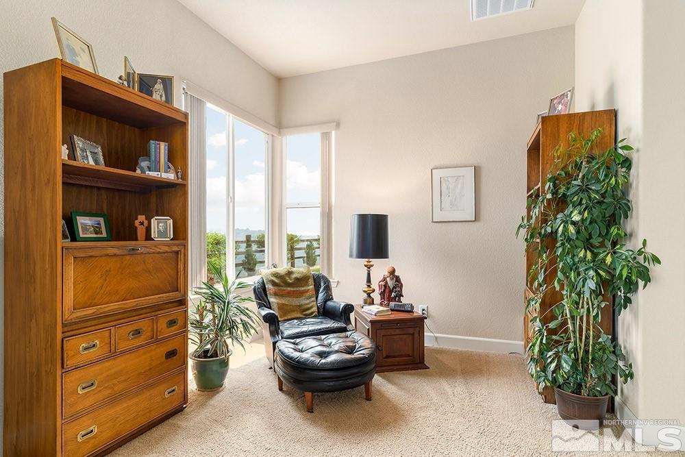 9266 Maplehurst Trail Reno, NV 89523 - Photo 18 of 29 a living room with furniture and a potted plant