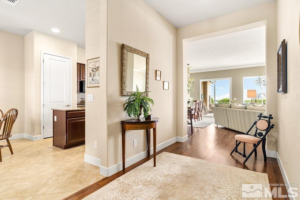 9266 Maplehurst Trail Reno, NV 89523 - Photo 2 of 29 a view of a livingroom with furniture and a potted plant