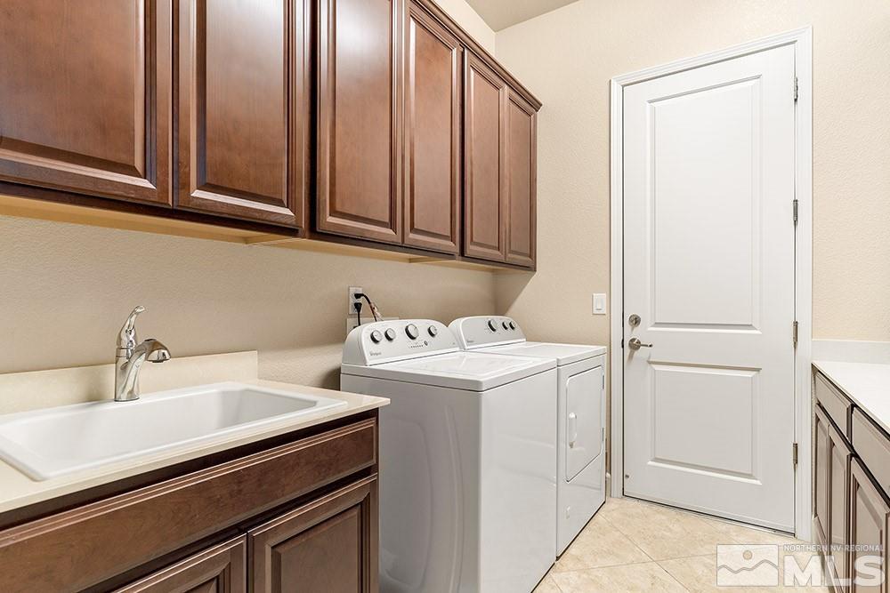 9266 Maplehurst Trail Reno, NV 89523 - Photo 21 of 29 a utility room with dryer and washer
