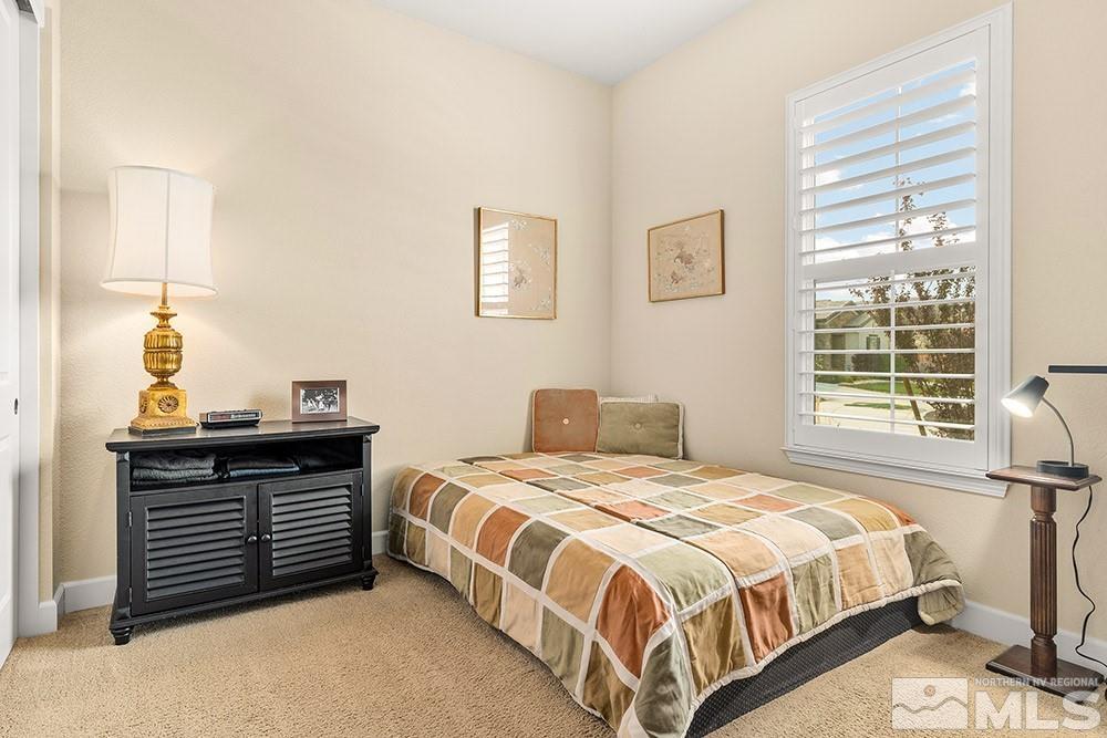 9266 Maplehurst Trail Reno, NV 89523 - Photo 22 of 29 a bedroom with a bed and a window