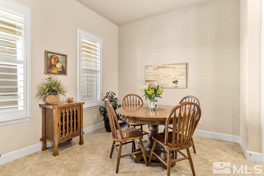 9266 Maplehurst Trail Reno, NV 89523 - Photo 4 of 29 a view of a dining room with furniture and window