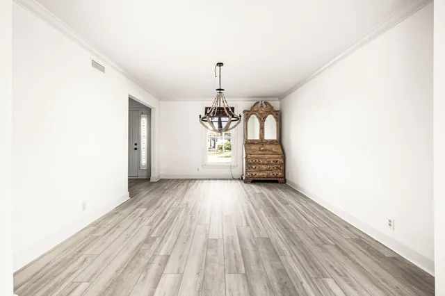 a view of an empty room and window