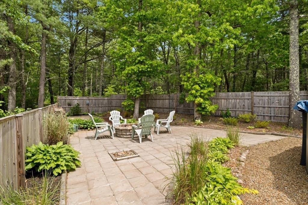 19 Station Street Wareham, MA 02571 - Photo 12 of 41 a view of a backyard with sitting area