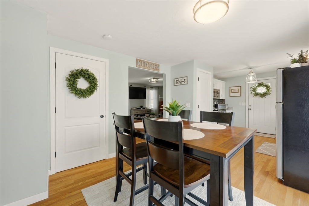 19 Station Street Wareham, MA 02571 - Photo 22 of 41 a view of a dining room with furniture and wooden floor