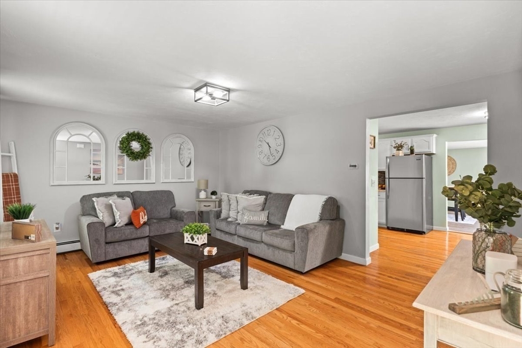 19 Station Street Wareham, MA 02571 - Photo 25 of 41 a living room with furniture and wooden floor