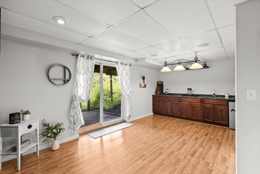 19 Station Street Wareham, MA 02571 - Photo 39 of 41 a room with lots of wooden furniture and shower