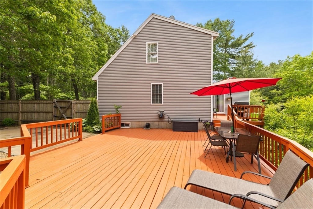 19 Station Street Wareham, MA 02571 - Photo 8 of 41 a balcony with table and chairs