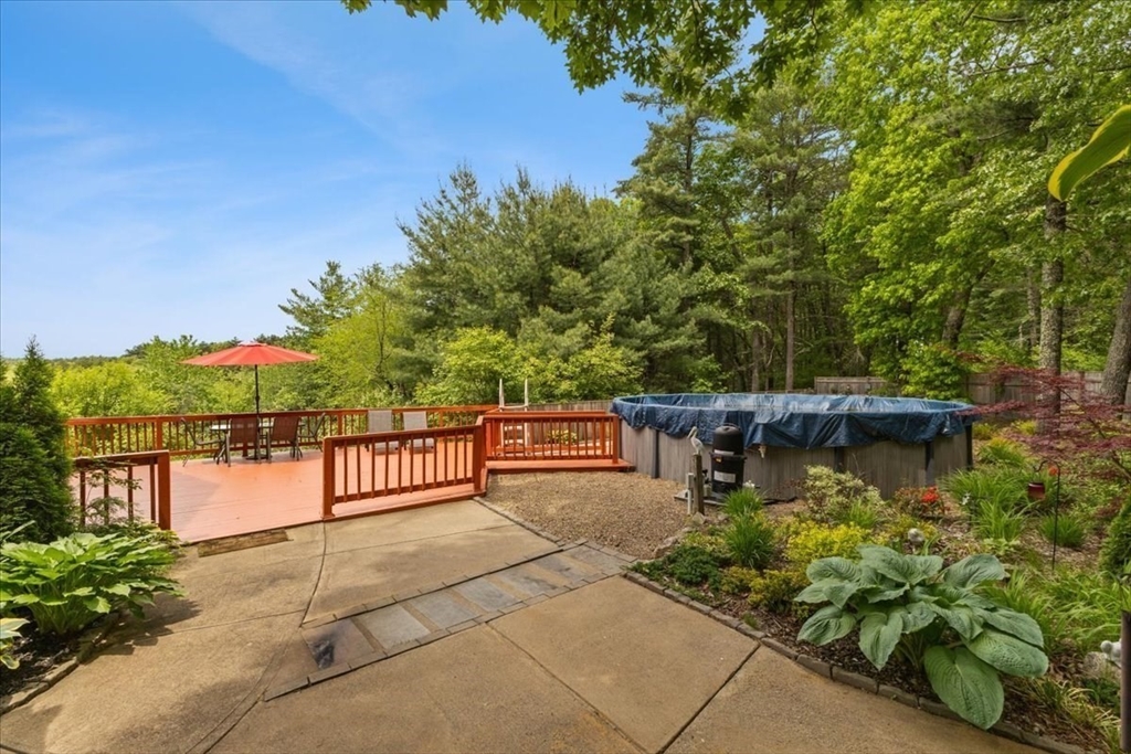 19 Station Street Wareham, MA 02571 - Photo 10 of 41 a balcony with trees in front of it