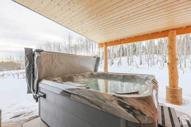 2029 West Tollgate Road Coalville, UT 84017 - Photo 39 of 43 Snow covered patio with a hot tub