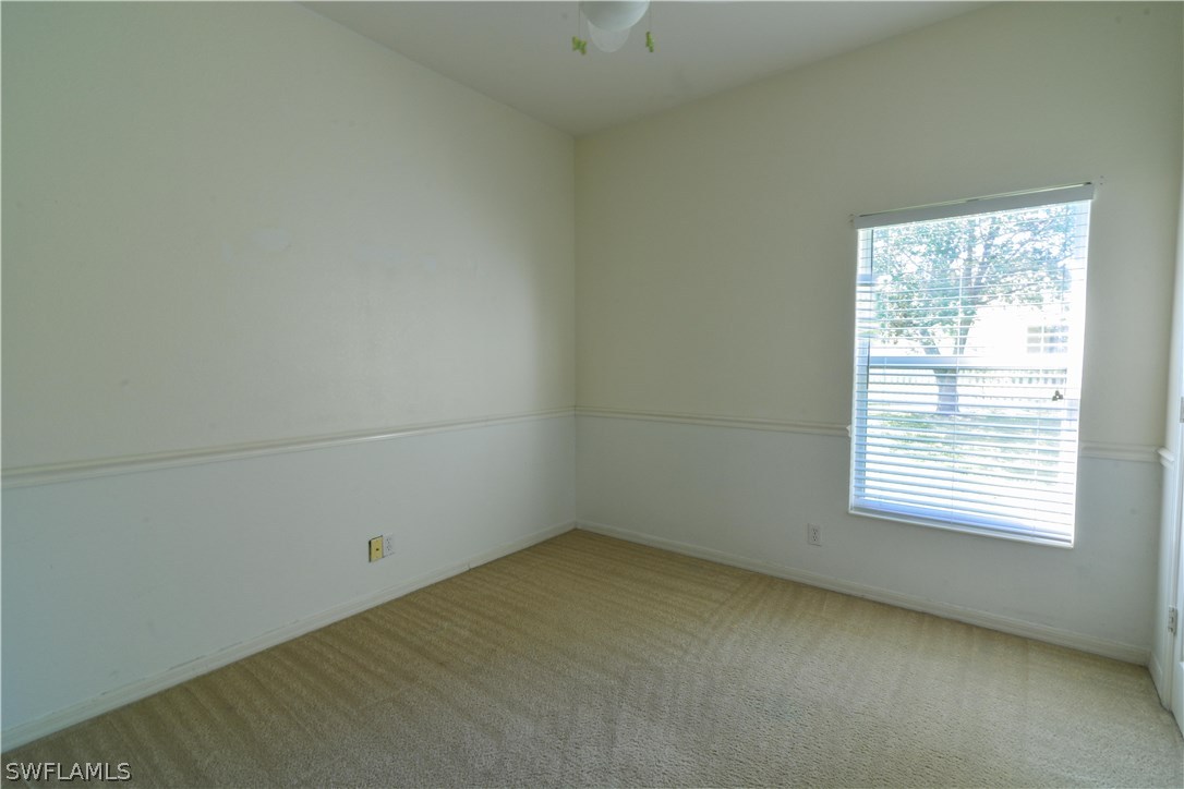 8960 Falcon Pointe Loop Fort Myers, FL 33912 - Photo 17 of 25 an empty room with a window