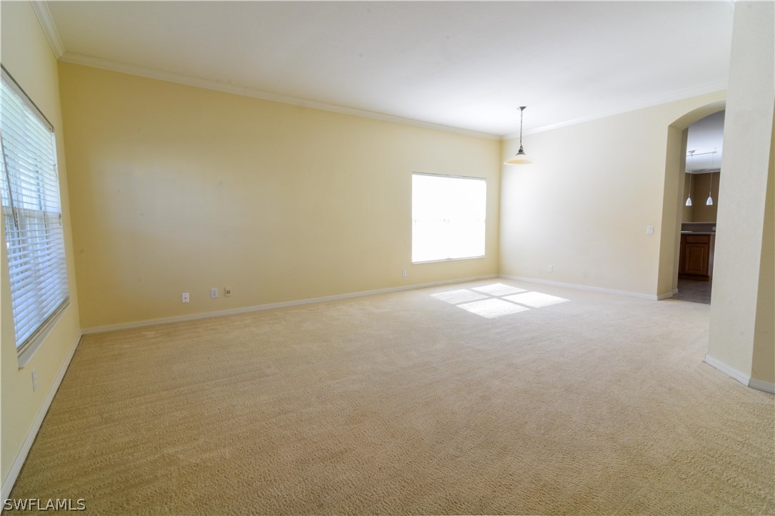 8960 Falcon Pointe Loop Fort Myers, FL 33912 - Photo 5 of 25 a view of empty room with window