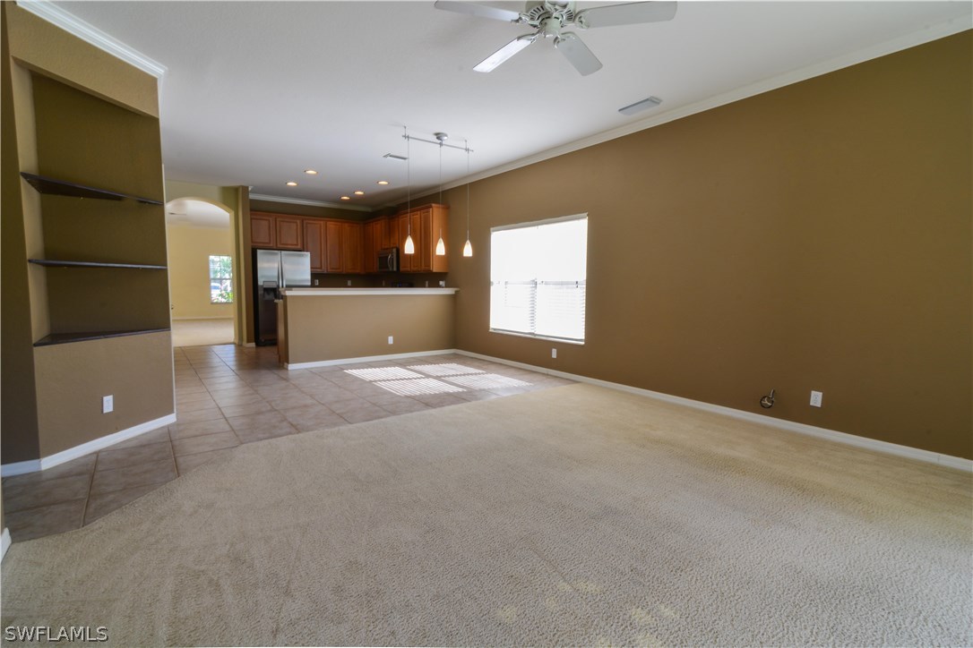 8960 Falcon Pointe Loop Fort Myers, FL 33912 - Photo 10 of 25 a view of a livingroom with a fireplace