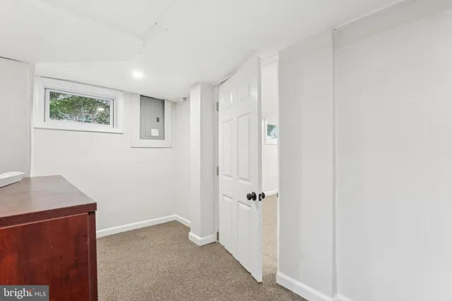 a view of a hallway with closet
