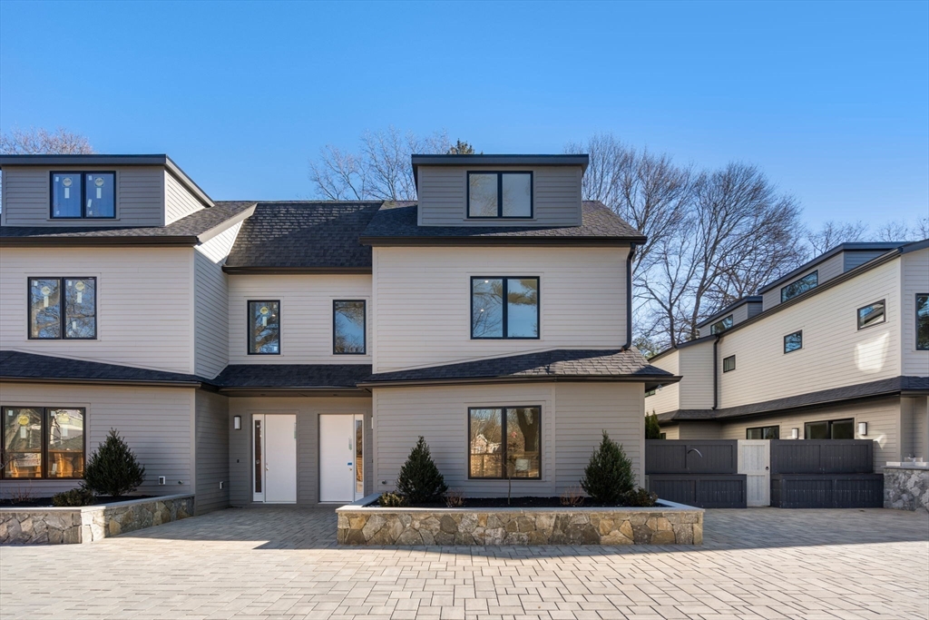 956 Walnut Street, Unit 5 Newton, MA 02459 - Photo 1 of 38 a house view with a outdoor space