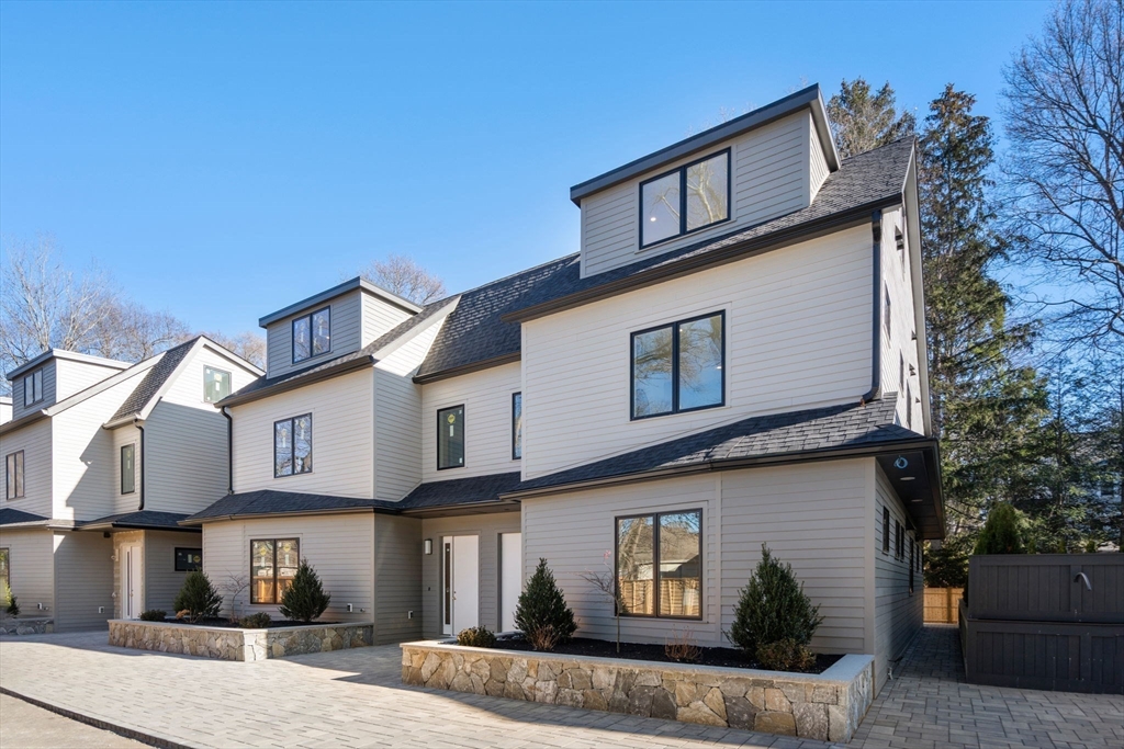 956 Walnut Street, Unit 5 Newton, MA 02459 - Photo 2 of 38 a view of a house with a street