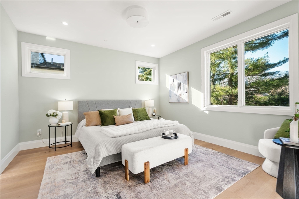 956 Walnut Street, Unit 5 Newton, MA 02459 - Photo 21 of 38 a bedroom with a bed and window