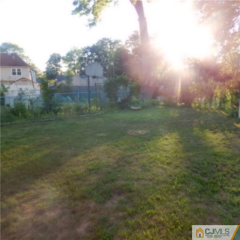 23 Idlewild Road Edison, NJ 08817 - Photo 19 of 19 a view of a big yard of a building