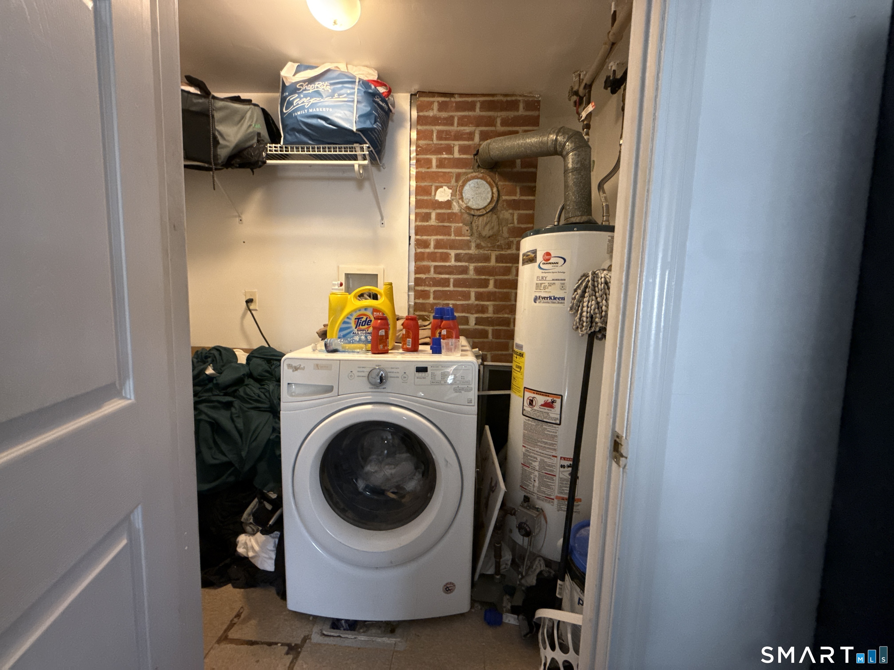 27-29 McLaughlin Terrace Derby, CT 06418 - Photo 16 of 16 a utility room with dryer and washer